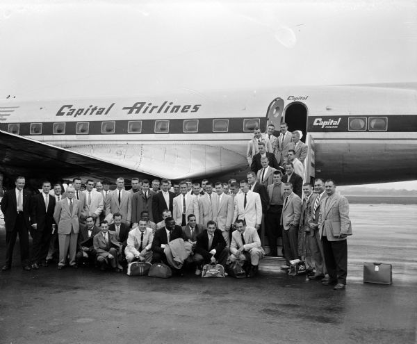 1954 - Boarding a plane